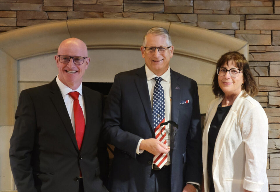MAPP's Todd Barnes, Candace Miller and Maurice Condon receiving Joplin Area Chamber of Commerce - Business of the year award. 